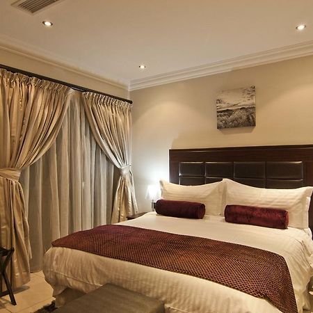 L'Eola Suites Αμπούζα Δωμάτιο φωτογραφία