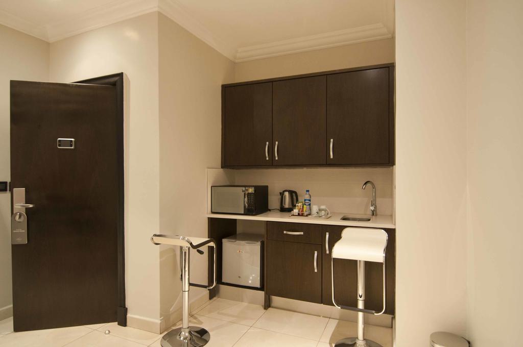 L'Eola Suites Αμπούζα Δωμάτιο φωτογραφία